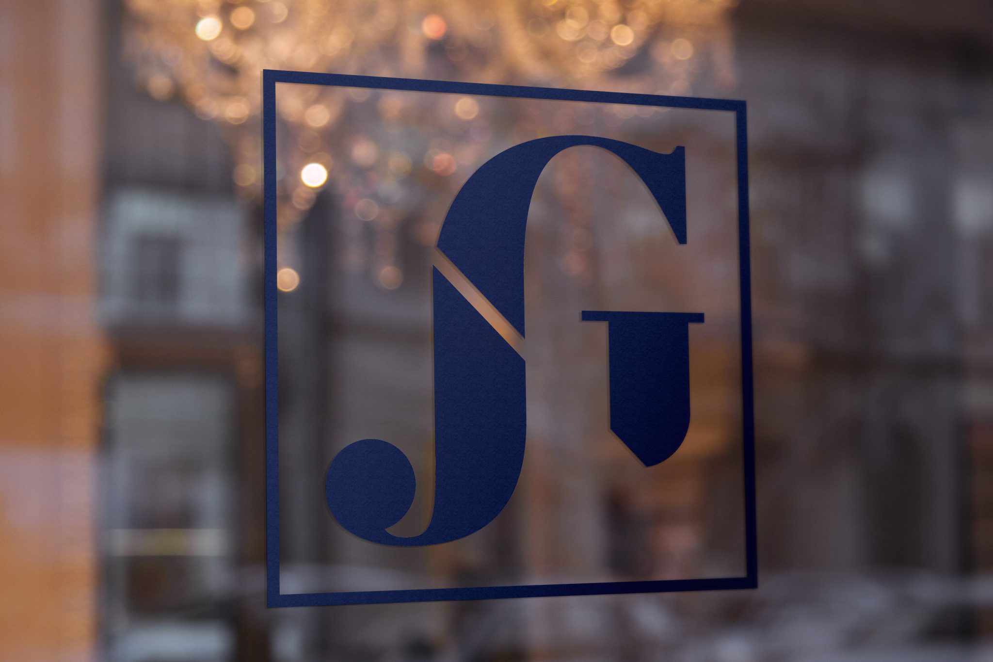 James Gostelow logo on glass